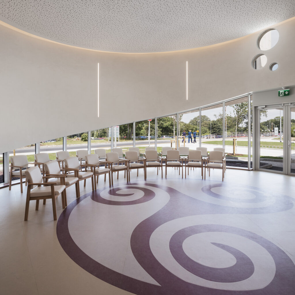 curved-prayer-room-with-marmoleum-floor-with-purple-end-of-life-symbol