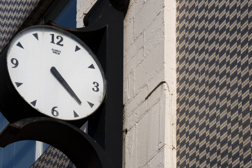 detail-of-morrissey's-blue-grey-and-off-white-mosaic-tiles-and-clock