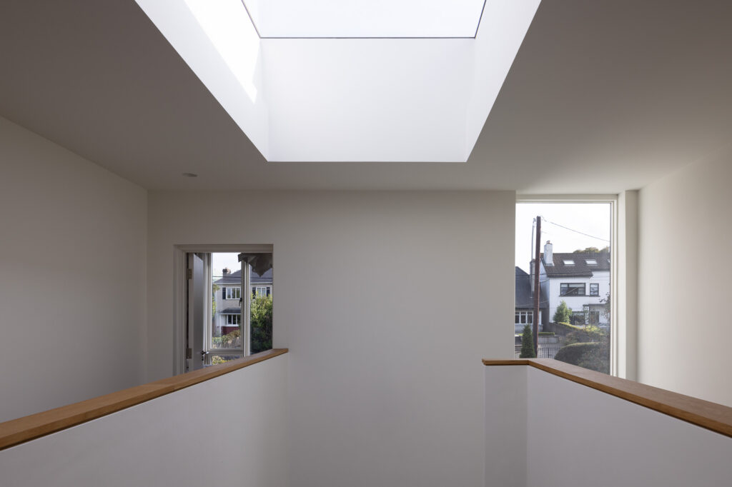white-atrium-with-rooflight-and-views-to-street