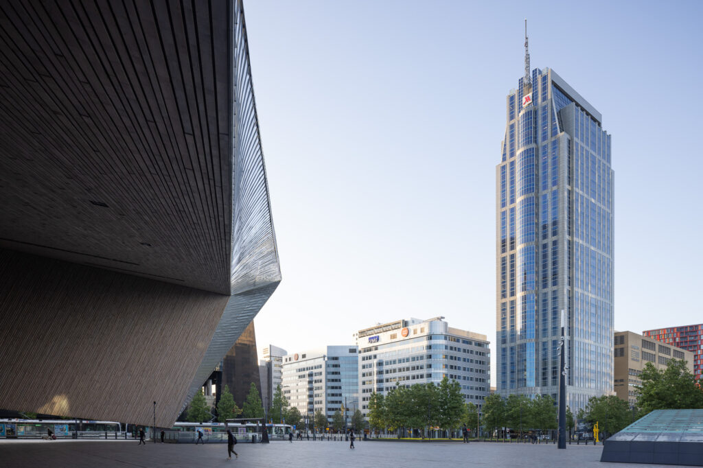 rotterdam-central-roof-pointing-to-tower-beyond-plaza