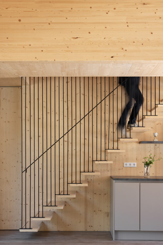 clt-barn-house-open-stair-hung-off-black-skinny-steel-balustrade