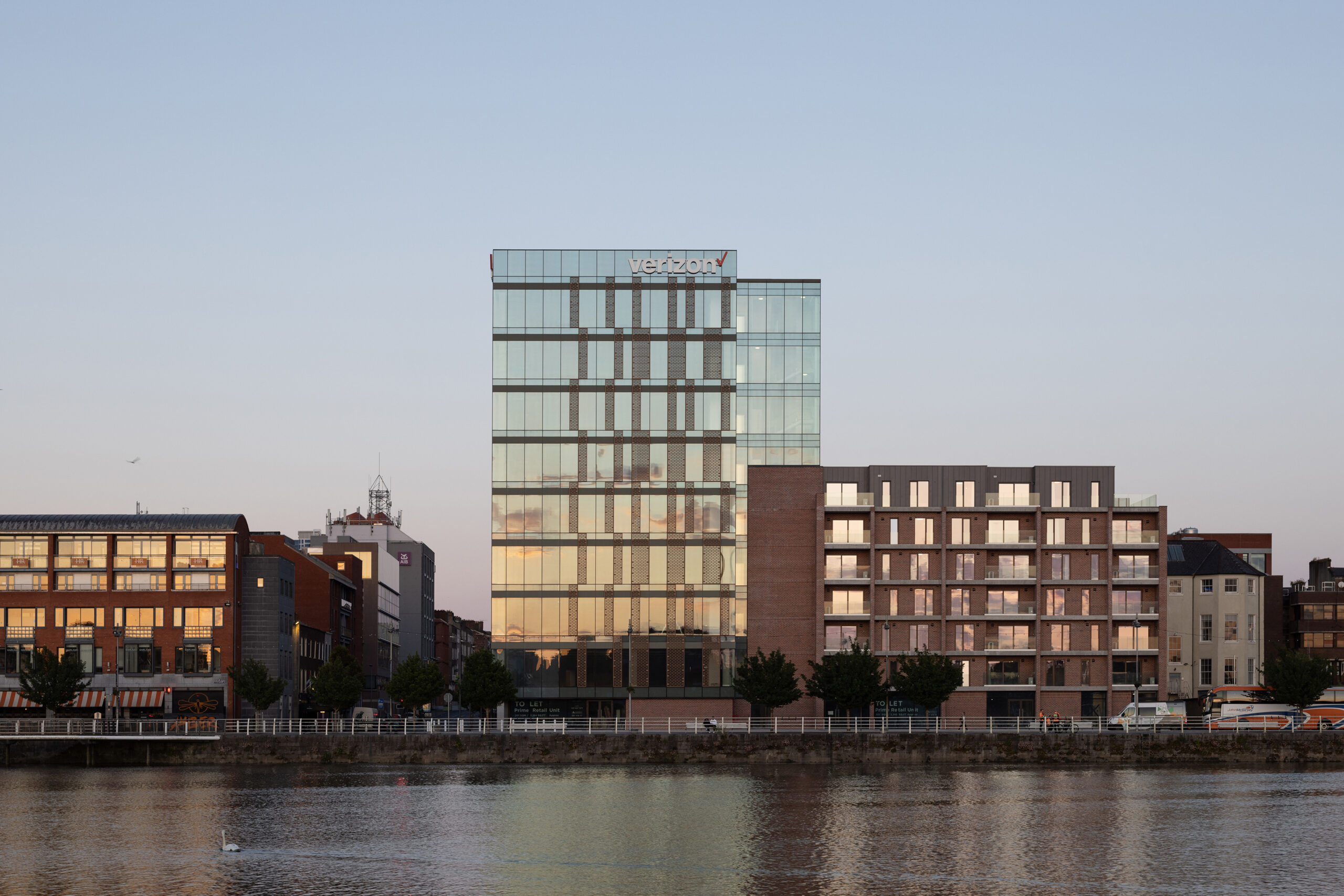 1BQ-Multi-storey-glass-and-brick-building-at-purple-sunset-healy-partners-architects-andrew-campion-photography