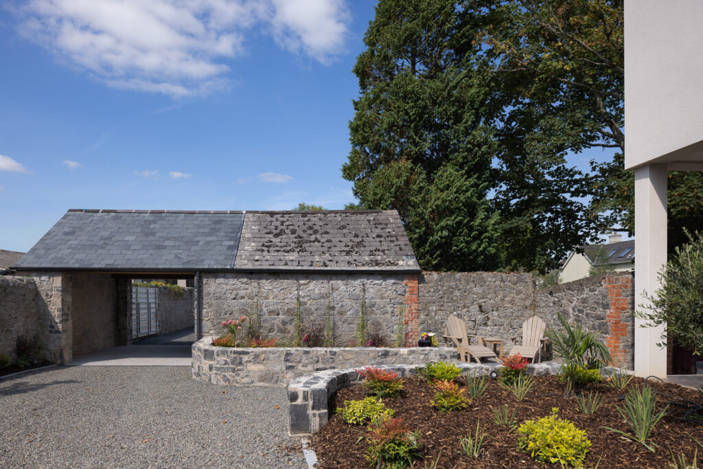 stone-walled-entrance-and-garden